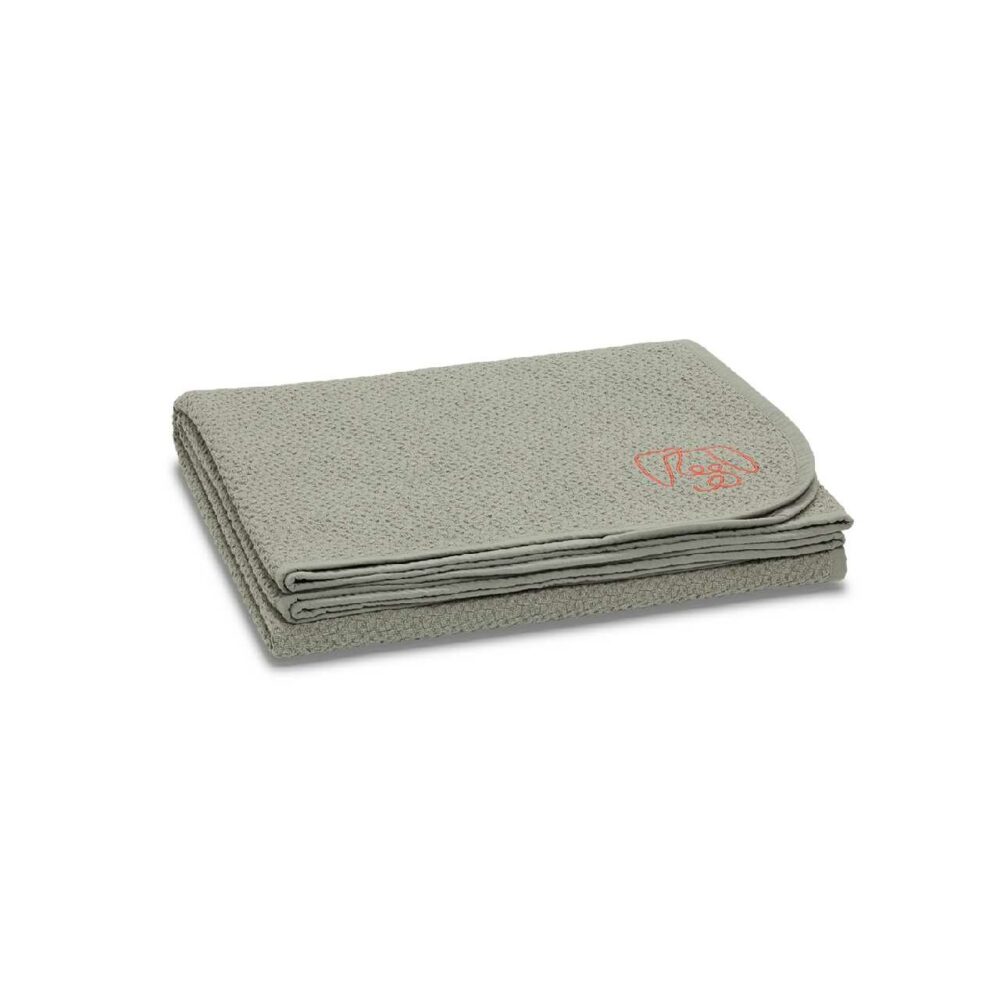 A grey, organic cotton dog blanket with a honeycomb weave design and percale trim. It features an embroidered logo and is heavier than most, providing gentle pressure to soothe dogs with anxiety.