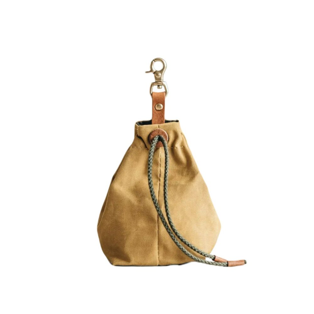 Front view of stylish and durable dog treat bag in Mustard by Band & Roll, made with lightweight and water-repellent waxed cotton. Handcrafted with solid brass hardware and full-grain vegetable-tanned leather.