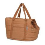 Product image of a light brown soft-sided dog carrier bag with adjustable straps and safety belt for comfortable and secure transportation.